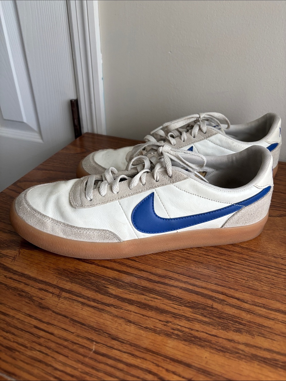 Nike White Leather Sneakers with Blue Swoosh and Gum Sole